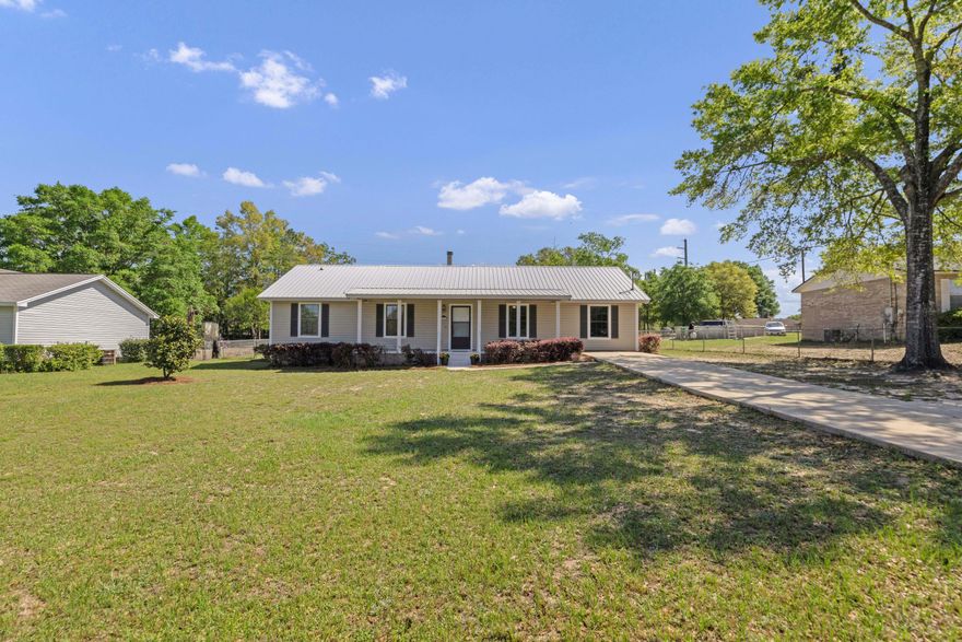 Charming 3-Bedroom Home on Lakeview Drive - DeFuniak Springs, FL Nestled in the heart of DeFuniak Springs, this delightful 3-bedroom, 2-bathroom home sits on just over a third of an acre in a peaceful setting on Lakeview Drive. Featuring a split bedroom floor plan, this home offers privacy and functionality for families or guests. The spacious living area is warm and inviting, with plenty of natural light. The kitchen is well-equipped with ample cabinet and counter space, perfect for preparing meals with ease. The primary suite includes its own private bath, while the additional bedrooms are comfortable and versatile. The home features fresh paint and flooring throughout, new countertops and new stainless steel appliances in the kitchen. Roof was replaced in 2017.