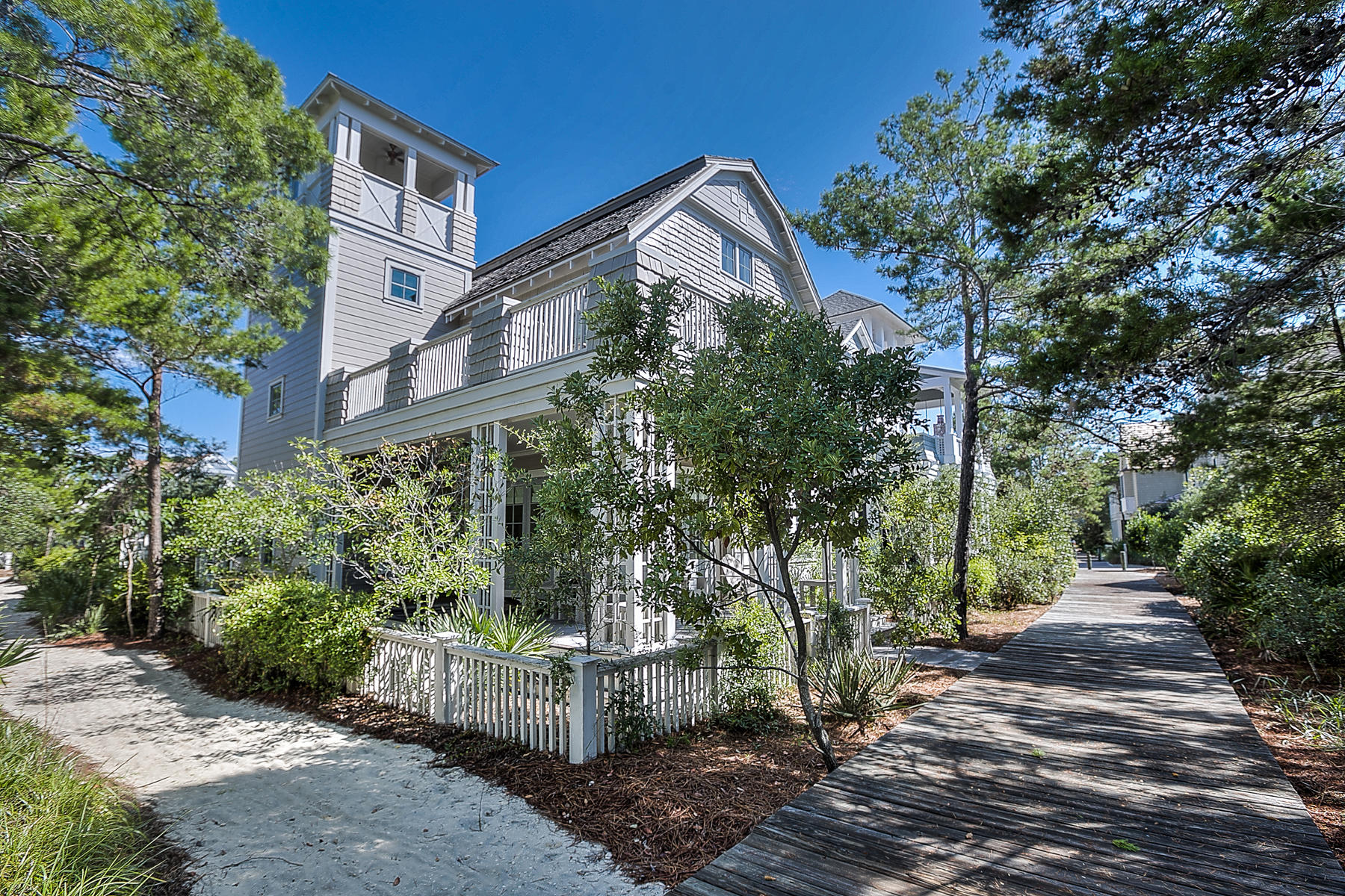 This beautiful home is located in the coveted Dune Ridge section of WaterSound Beach. Just steps to the beach, this home is all about coastal living. Abundant natural light, open floor plan, great decks, huge kitchen for entertaining, tabby shell fireplace, tower with gulf views and an adorable guest house are just a few of the special features. This home exudes casual elegance and is being offered fully furnished except art work and accessories. The gated neighborhood of WaterSound Beach has 5000 feet of beach front, rolling dunes, a puttering park, neighborhood pools and fitness center. Enjoy all the peace and tranquility this beautiful neighborhood offers.