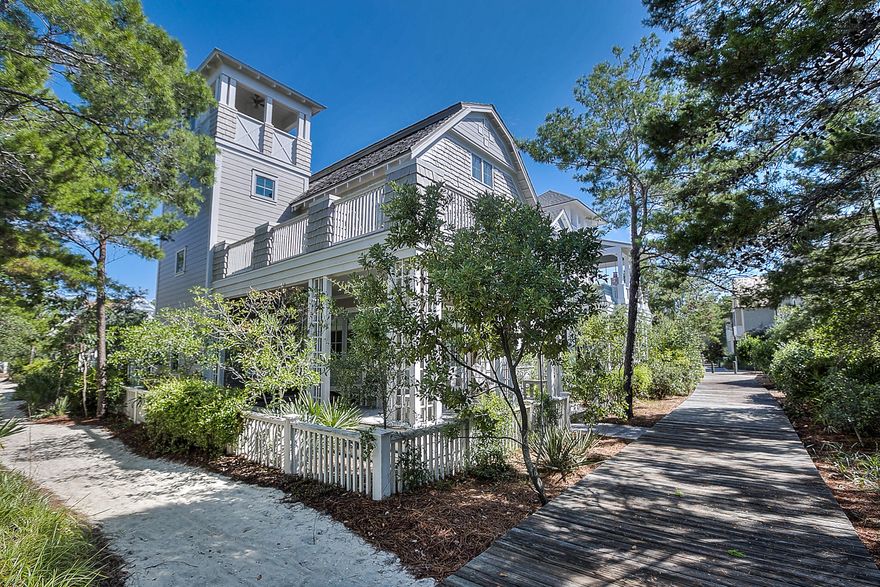 This beautiful home is located in the coveted Dune Ridge section of WaterSound Beach. Just steps to the beach, this home is all about coastal living. Abundant natural light, open floor plan, great decks, huge kitchen for entertaining, tabby shell fireplace, tower with gulf views and an adorable guest house are just a few of the special features. This home exudes casual elegance and is being offered fully furnished except art work and accessories. The gated neighborhood of WaterSound Beach has 5000 feet of beach front, rolling dunes, a puttering park, neighborhood pools and fitness center. Enjoy all the peace and tranquility this beautiful neighborhood offers.