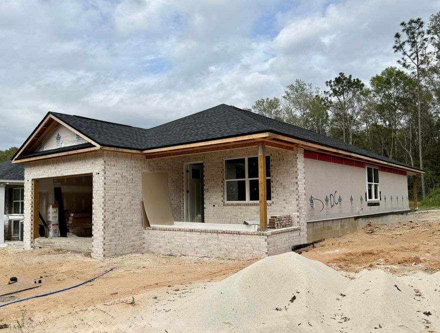 ***BUILDER INCENTIVES *** COMPLETE WITH BLINDS AND A REFRIGERATOR IN ADDITION TO SELLER'S CONTRIBUTION OF UP TO $10K TOWARDS BUYER'S CLOSING COSTS!! Unlock the door to your future as you discover the difference in exceptional quality w/ this newly constructed home in South Crestview. Built by Parade of Homes Award Winning Builder and convenient to military bases and I-10, this 3 bd/2 ba new build is located on nearly 3/4 of an acre. Exterior of the home boasts both a front covered porch and rear covered porch. Inside you will find LVP flooring throughout and an open floor plan. Kitchen boasts beautiful white cabinetry, stainless steel appliances and quartz countertops. Master suite has dual vanity, walk-in closet and shower. Nice sized guest rooms! Est date of completion is MID MAY!
