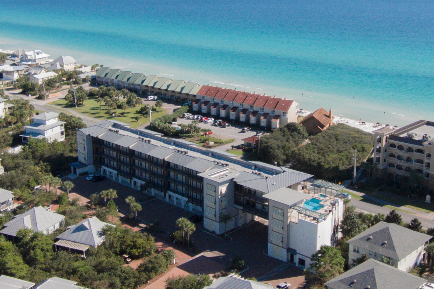 Experience living life to its fullest at Waterhouse, located directly on Scenic Highway 30A between WaterSound Beach and Alys Beach. Developed originally as a private residence club, Waterhouse exceeds ordinary expectations of what a condo development should offer, and effortlessly delivers an extraordinary vacation home lifestyle experience. This gulf view residence located on the 4th floor is offered fully furnished and rental ready. On-site amenities include a unique rooftop deck with pool, spa, and grills, an owner's lounge with full-service kitchen and game room, an unparalleled fitness center with steam sauna, dry sauna, and locker storage, as well as beach access immediately across 30A.
