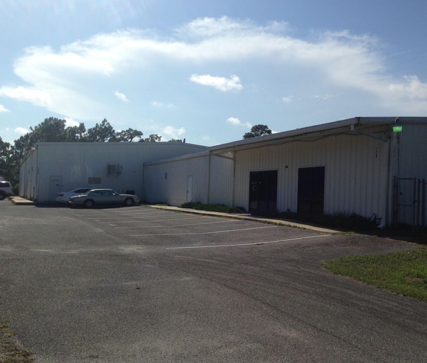 located adjacent to Eglin Air force Base on the corner of Lovejoy Road and Stokes Ave. Large corner lot that is fenced and improved with a 16,205 square foot building that has approx. 6,000 square feet of office area and 10,200 square feet of warehouse/manufacturing space.