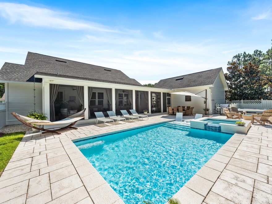 Situated on a spacious corner lot, this charming residence features a private heated pool, spa, fire pit and bocce court providing an idyllic backyard retreat. The immaculate homes sits on an oversized lot and boasts excellent curb appeal and enhanced landscaping. The front walkway leads to a welcoming front porch, inviting guests to relax and unwind.The interior exudes a light and airy ambiance in the open living room, dining and kitchen areas. Shiplap walls, built-in bookcases, medallion wood flooring, ten-foot ceilings, and a beverage/wine refrigerator contribute to the home's unique charm. The kitchen includes a Wolf six-burner stove plus oven and large marble island which is the ideal spot for breakfast gatherings. The spacious screened porch with sizable sitting and dining areas overlooks the backyard oasis. The six foot fence ensures privacy to enjoy all of the outside activities and is surrounded by mature trees. The paver patio offers plenty of room for loungers and chairs for relaxing. Additionally, a mosquito control system and new exterior lighting have been installed throughout.


The elegant master suite offers a tranquil retreat with access to the screened porch, walk-in closet and ensuite with makeup vanity. Three additional bedrooms, two full bathrooms and a powder bath complete this one-level residence.


Numerous high-tech features throughout the house include a Ring doorbell system, home security, and Sonos which extends throughout the home and onto the back porch. For enhanced peace of mind, the residence is equipped with a Generac whole-house generator and upgraded new large-capacity Samsung washer and dryer units. The two-car garage connects through the screened porch and provides ample space for storing beach toys, bicycles, and sports equipment.


Situated within the Watersound Origins community, this picturesque property benefits from a range of shared amenities, including a resort-style pool, walking trails, and tennis courts. The vicinity boasts an abundance of 30A shops, restaurants, live entertainment venues, and pristine beaches, all within a short distance of Rosemary, Alys, and Inlet Beaches.