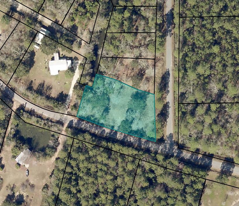 The perfect opportunity for a builder or someone dreaming about building their forever home on property full of hard wood trees. This gorgeous partially cleared lot in Milton has canal access, a 100+ year old oak tree, and has been partially cleared, only leaving the beautiful hard wood trees for you to choose from! Owners are willing to sell with lot next door (parcel ID: 08-1S-28-5510-00000-1050) for a combined discounted rate.