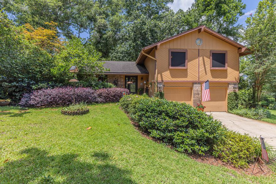 Uncommon Tri-Level floor plan located in Magnolia Shores where homes rarely become available. Upon entering the front leaded glass door to the main level of the home, the formal living room has a sloped ceiling, brick front, wood burning fireplace with hearth and blower. Formal dining room area will comfortably accommodate table seating for a minimum of six. Kitchen has all stainless-steel appliances, adequate cabinet storage with a breakfast bar that can double as a serving area or cooking prep area. Corian countertop has a 60/40 split sink and a full view slider window looking out to the backyard. Breakfast nook area has a sliding glass doors leading into the screen porch and a half flight of stairs taking you down to the third floor. Click ''read more''