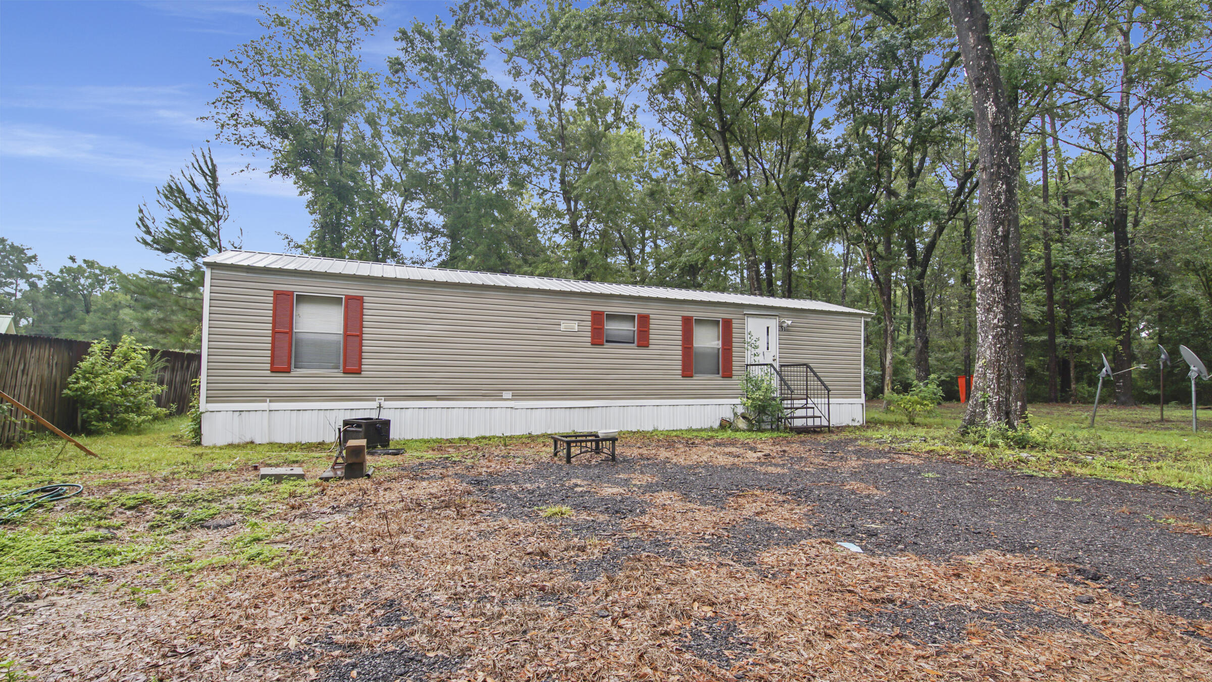 Come check out this 2Bd/ 1Bath manufactured home on .55 acres in the area of Bruce, FL. The best part is there is no HOA, No Homeowners Association dues. It is very close to the Choctawhatchee River and the Choctawhatchee Bay. With the black creek public boat launch close by; there is no need to miss another sunset on the water. Not to mention you are not far from some of the World's Most Beautiful Beaches and all the action of shopping, dining, and entertainment that Southern Walton County provides. Don't let this home get away.