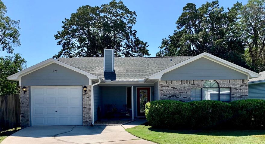 BACK ON THE MARKET through no fault of seller!  This could be a fast close with inspections all completed!  Well cared for with beautiful backyard in such a convenient location!  The kitchen has white cabinets with stainless steel appliances and a back door with a doggy door leading out to a patio, perfect for grilling out.  The huge living room with fireplace is open to the kitchen with French doors leading to a screened-in porch giving you even more space.  The Master bedroom is separated from the other two bedrooms and has closets that are built out for great storage!  The backyard is surrounded by an almost new privacy fence and is fully sodded.  This house has everything you need.  Don't wait long to take a look at this house -- it won't last!