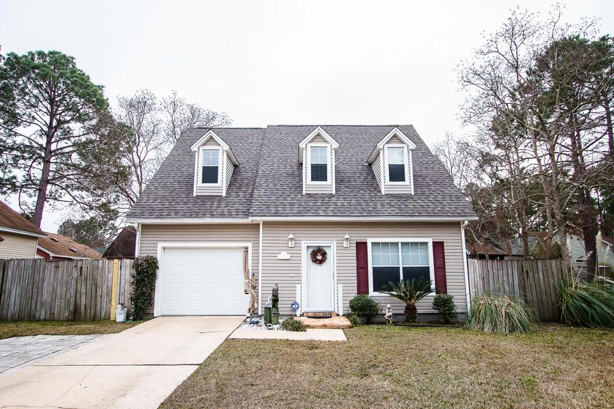 We can't get over how beautiful this three bedroom, two and a half bath colonial style home is! Around every corner is a new detail that catches the eye and interest of the observer. As you walk through the front door and through the foyer, you will enter the an open living area and kitchen. The living area connects to the backyard and a small hallway that leads to the utility room, a half bath and the attached garage. As you walk up the stairwell, you will enter a naturally lit foyer. Two additional bedrooms, a full bath, the master bedroom and master bath are all on the second story. The cathedral ceilings in the master bedroom give it an open feel and the large skylight lets light flood into the spacious master bath. This home is a must see and perfect for a growing family!
