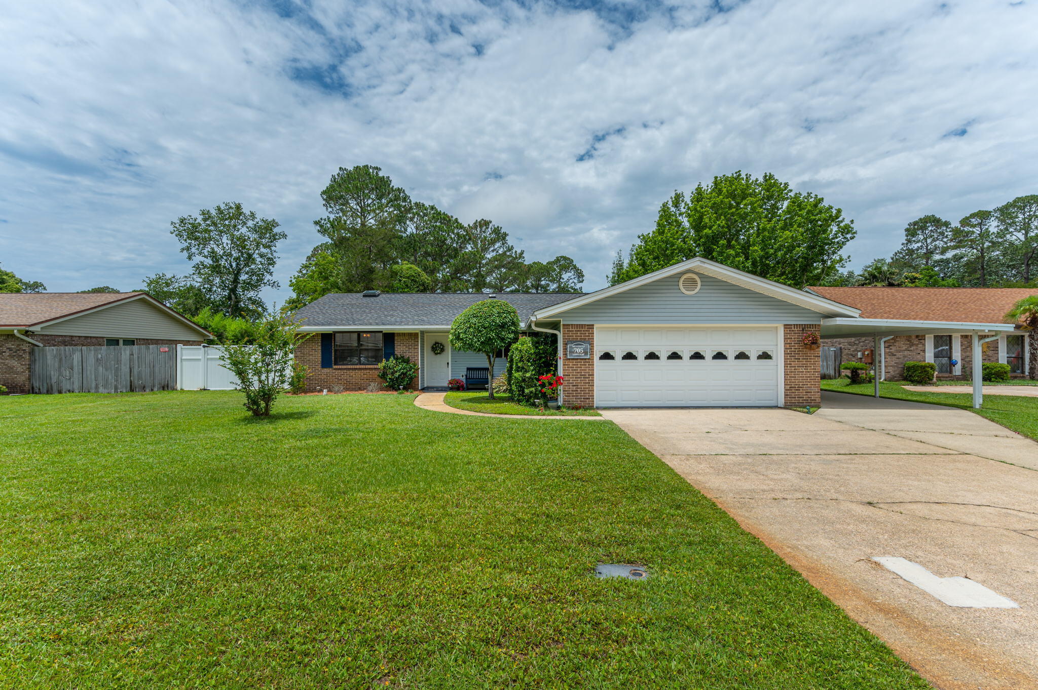 Perfectly located, perfectly renovated, spacious home central to both Hurlburt and Eglin AFB. Open floorplan with many upgrades. Newer stainless appliances, granite countertops, pull out pantry drawers, and newer cabinets. Stainless one-basin kitchen sink with upgraded fixtures. Hard floors throughout, upgraded ceiling fans, and large closets! Master boasts an impressive renovated bathroom with quart countertops! Cool off in the evening quiet in the screened porch enclosure. The backyard is privacy fenced for the pets. 2 car garage, and additional concrete drive and carport for the cars and toys. Neighborhood features underground utilities, sidewalks, and NO HOA!! Also known as the 'Christmas neighborhood' with a fabulous holiday display. ROOF 2016, A/C 2016, W/H 2019