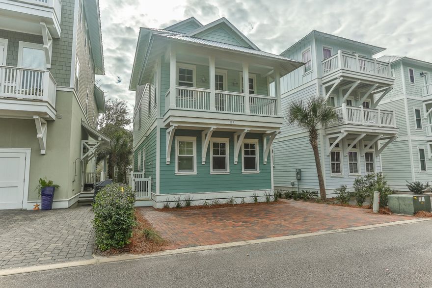 $20,000 FURNITURE ALLOWANCE with full price offer!!! One of the best opportunities in Carillon Beach! 109 Cottage Ct. is currently under construction, being built by Chi-Mar Construction. This home will offer everything one would expect of a Carillon Beach home. An open floor plan is complemented by features that exude chic beach living. Beautiful hardwood floors, granite counters, stainless steel appliances, wood-wrapped walls, luxurious bathrooms and spacious balconies are just the beginning to the long list of impressive upgrades. Backing to a tree lined pedestrian walkway and only a block away from the deeded beach access, enjoy the peacefulness that the gated community of Carillon Beach offers.