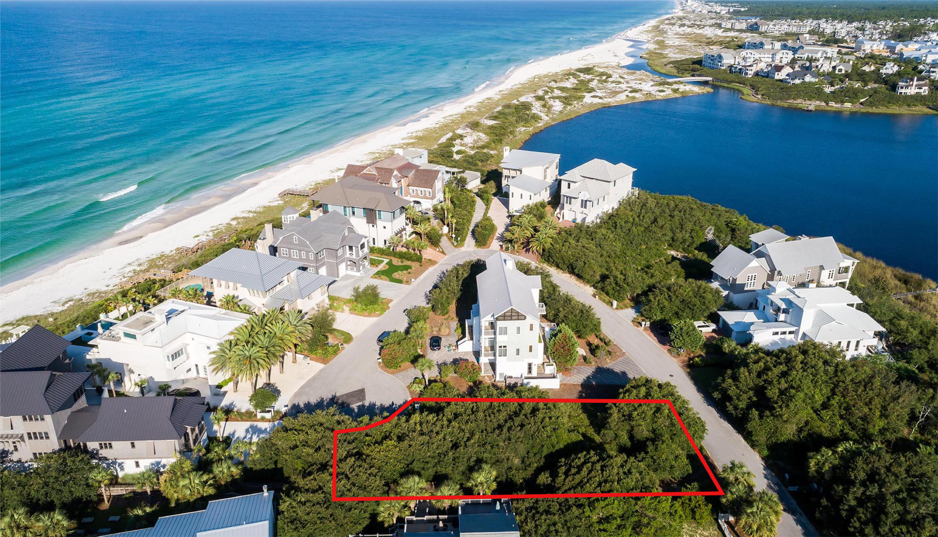 Majestic and unparalleled views of both the turquoise waters of the Gulf and Camp Creek Lake, of one of the world's rare coastal dune lakes, are offered from this spacious home site. The gated community of Camp Creek Point is comprised of only 16 home sites and perched on a spectacular point offering serenity, private deeded beach & lake access and living in harmony with lush native landscaping. Amazing homes accentuate this non-rental community. No build out time. Oak canopied beach and lake walkovers border this large home site. Hidden away from the crowds, yet great proximity to the restaurants & shops of Seaside, Alys Beach, WaterSound and Rosemary Beach. The natural and undisturbed allure of this ''peace'' of the shimmering sands is undeniable. Perfection.