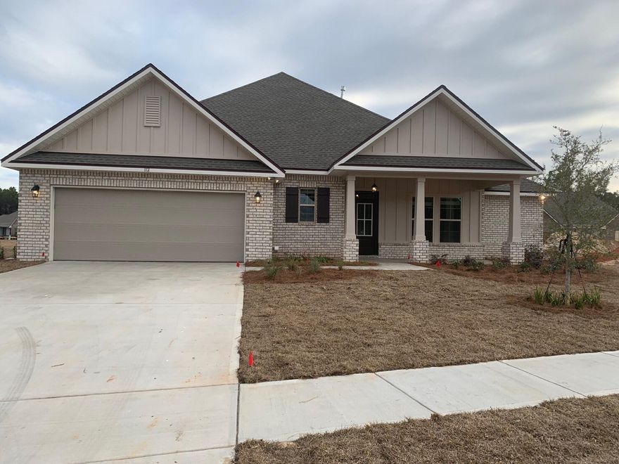 The TAYSOM III G in The Trails at Hammock Bay community offers a 5 bedroom, 3 full bathroom, open 2-story design with the master on the lower level and a bonus room upstairs. Upgrades added (list attached).
Special Features: separate vanities, garden tub, separate custom tiled shower, and walk-in closet in master bath, double vanity in the 2nd bath, pocket office on lower level, kitchen island, walk-in pantry, boot bench in mud room, covered porch/patio, recessed lights, undermount sinks, ceiling fans, bronze plumbing fixtures, custom framed mirrors, smoke and carbon monoxide detectors, landscaping, architectural 30-year shingles, and more!
Energy Efficient Features: tankless gas water heater, kitchen appliances with gas range, vinyl low E-MI windows, and more!