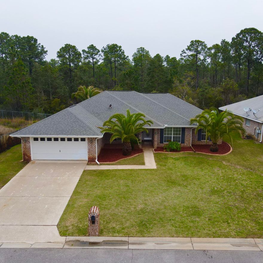 Welcome to this beautifully maintained 4 bed/2 bath 2281 sqft brick home, featuring a generous living space, dining room, large office/bonus room, and screened in porch. There are tile floors throughout, a brand new dishwasher, new HVAC in 2015, new stove in 2017, 2015 water heater, and fresh paint.  Backed up to the woods with only one neighboring home, the backyard has a very private feel.  This home is situated in close proximity to Hurlburt Field and beaches.
