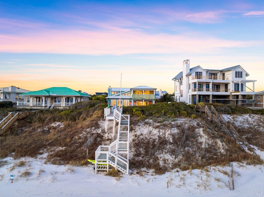 Embrace the epitome of luxury beachfront living with panoramic Gulf views adorning many areas of this exceptional residence. Transformed into a 4-bedroom haven, plus loft and media room, with the potential to reclaim its former 5-bedroom glory, this Geoff Chick remodel exudes sophistication and offers seamless indoor-outdoor entertaining spaces designed to perfection.Nestled within a gated community with private beach access, this home boasts 76 feet of awe-inspiring beachfront. Step through the NanaWall glass wall to discover a heated saltwater pool harmoniously unified into the dunes, complemented by multiple outdoor seating areas including a sunset viewing haven.