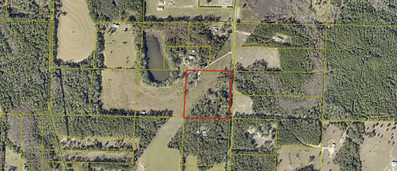Welcome to beautiful North Walton County. This listing includes 10 acres of high and dry land with an approximately 7 acre pond on an additional parcel. There is an old homesite on the property that has been given no value. The land is partially cleared with plentiful, mature hardwoods. Land like this doesn't come available often and must be seen to be appreciated.