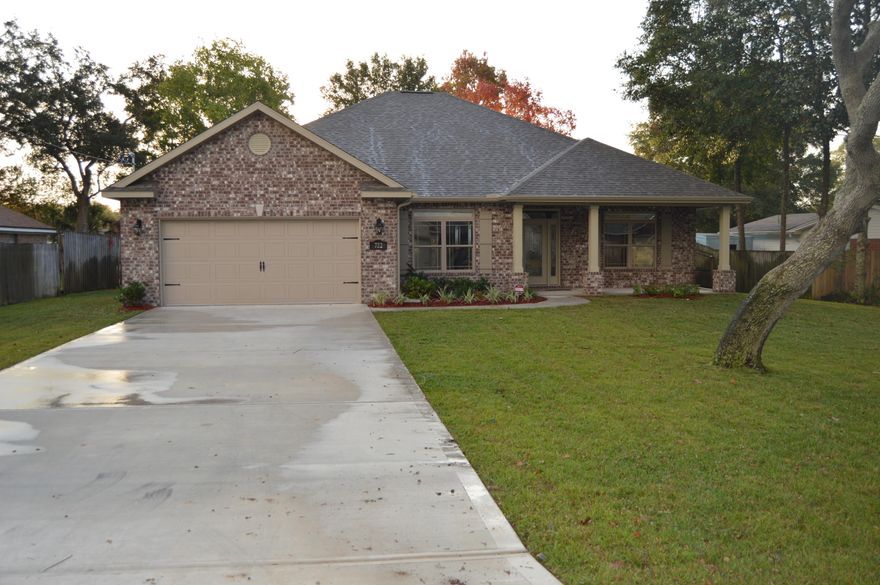 Be the first to live in this beautiful, all brick home built in the beloved Kenwood subdivision by a local multi award winning VA Approved builder. This home, which sits on over a 1/4 acre lot, features 4 bedrooms and 2.5 baths. The master suite has a trey ceiling and a walk-in closet. Master bath has a double vanity, garden tub w/ separate shower. The kitchen comes with stainless steel appliances and granite countertops. The 15x23 living room with a double trey ceiling is perfect for entertaining. The yard is completely landscaped to include a lawn pump and sprinkler system. You can enjoy the backyard from your 15x9 covered lanai.