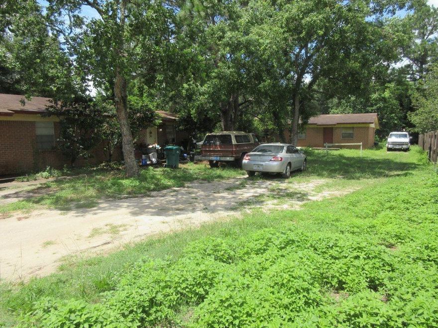 This is 2 duplexes on the same lot. Units A & B are closer to Shady Lane.Unit C & D are parallel to Shady Lane toward the rear of the property. Each unit is 750 SF with 2 bedrooms and 1 bath. Unit A has a dishwasher. All unit are month to month. Unit A is subsidized through HUD.