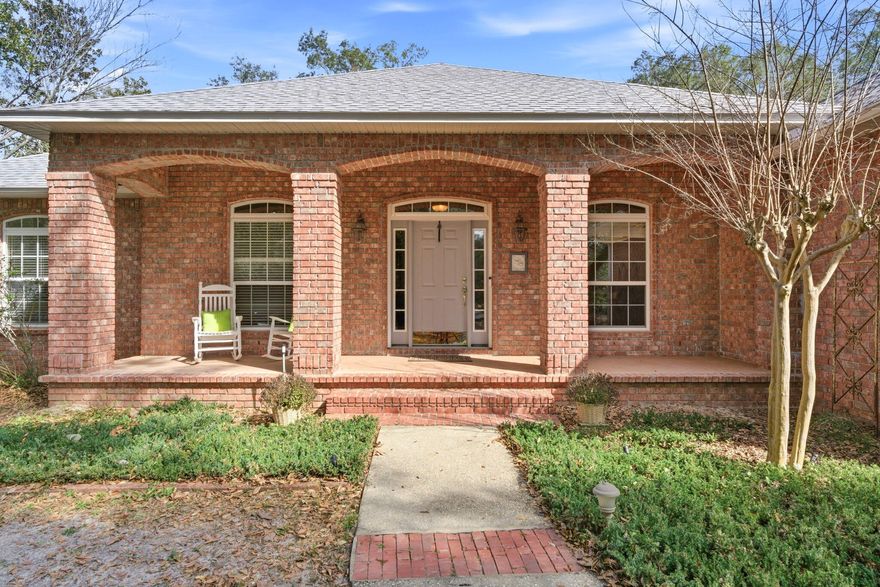 Welcome to Robledal Estates--one of Navarre's most beloved and historic bayside neighborhoods.Rich in character and timeless charm, Robledal is known for its winding, curvy roads, towering oak trees, and shaded streets that invite evening walks, dog strolls, and a true sense of community. This is one of the rare neighborhoods where the mature trees were preserved, giving the area its signature canopy and cool coastal feel. Each home here is uniquely designed, and many residents have called Robledal home for 30+ years--proof of just how special this neighborhood truly is. Perfectly positioned in the heart of the Emerald Coast, Robledal Estates offers easy access to local schools, shopping, dining, and quick commutes to both Destin and Pensacola, all while enjoying the relaxed lifestyle of bay living.

This charming property sits on an impressive .69-acre homesite with no HOA.

As you arrive, you'll immediately appreciate the abundance of parking, featuring a side-entry driveway, circular drive for easy in-and-out access, and additional concrete parking. The spacious yard offers endless possibilities--including room for a future pool--and includes a picturesque shed with a swing, adding to the home's inviting outdoor appeal. The sellers recently added a beautifully screened back porch, creating the perfect space to relax and enjoy the peaceful surroundings.

Inside, the home has been lovingly maintained and has had only two owners, a rare find. It offers three bedrooms plus a bonus office, along with two full bathrooms thoughtfully positioned on opposite sides of the home, ideal for privacy and functionality.

Major systems have been well cared for, including a brand-new architectural roof--a huge benefit for insurance savings. The HVAC system has been consistently maintained and operates efficiently, and the water heater is approximately 8-9 years old.

The home is on septic, helping keep monthly water bills low--averaging around $30 per month for a family of four. The septic system is newer (not original), was recently inspected and pumped within the last year, and is conveniently located toward the rear of the property for peace of mind.

Best of all, this home is not located in a flood zone, meaning no flood insurance is currently required.

Homes in Robledal Estates rarely come available. This is your opportunity to own a piece of Navarre's history, enjoy generous land, and create lasting memories in one of the area's most cherished neighborhoods.