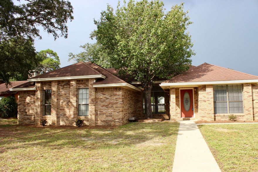 Located in the center of The Woodlands Subdivision in Bluewater Bay is this fantastic full brick home on a corner lot! This home has a new A/C, new ductwork, fresh paint, and a HUGE backyard! Make sure to check out the new white cabinets and subway tile backsplash in the kitchen! No carpet here, only laminate floors and tile. Enjoy parking your vehicles in the large garage, with bumpouts for storage or a workshop. Need more? Space is also available in the newer storage shed in the backyard! All measurements to be verified by buyer. Buyer can join Bluewater Bay to use the neighborhood pool. Neighborhood park and playground is for community use.