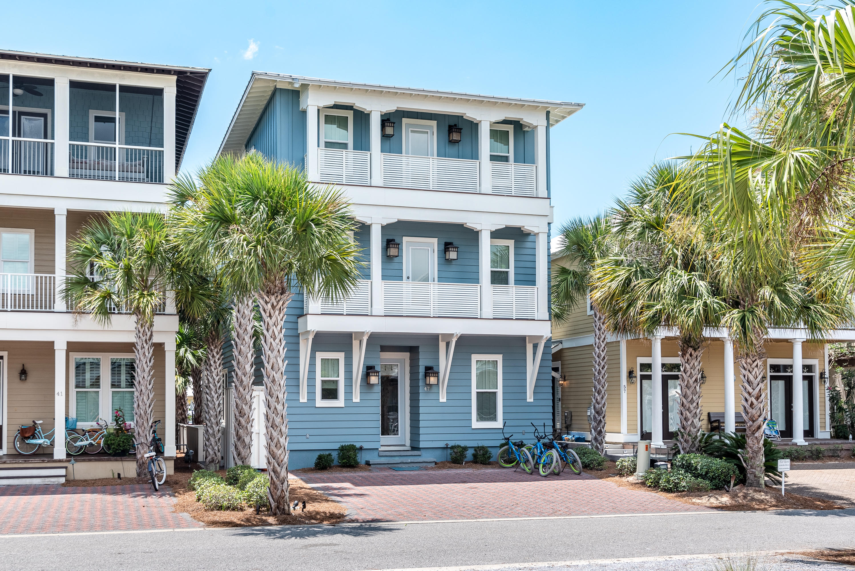 Enjoy the 30A lifestyle in this beautiful Seacrest Beach home! The 4 bedroom, 4 1/2 bath beach home sits directly on the large 12,000 sf community pool with beautiful views from every level! Open concept with an expansive kitchen, living and dining area which make perfect for entertaining. Updates include newly painted exterior and interior, new granite counter tops in the indoor and outdoor kitchen, newly painted cabinets, all new furniture including patio furniture, and new interior lighting. Hardwood floors, granite and marble counter tops are located throughout the home. Gorgeous ground floor full outdoor kitchen features a gas grill and refrigerator. Plenty of outdoor living area on all three levels of home! Enjoy entertaining guests on the oversized 3rd floor party deck with sitting area and pingball table. Exceptionally large master bedroom on the second floor includes a wet bar/coffee station, mini fridge, great amount of storage and large balcony with beautiful views of the pool. Third floor includes lounge and game area with plenty of sleeping room and living area with private bath. Seacrest Beach includes deeded beach access that is just a short walk away. Seacrest Beach shuttles run and are ready to pick you up! A short walk to all of the shops and restaurants at The Village of South Walton, Rosemary Beach and Alys Beach! This home is in one of the best locations in Seacrest Beach next to the large community pool. This home is a rental machine and is a must see!