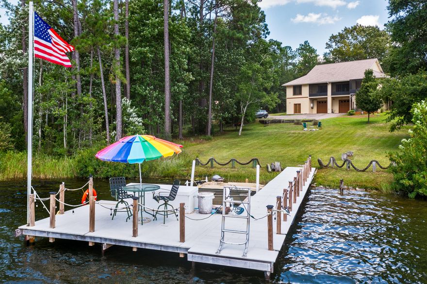 Exceptional, custom built lakefront home in Spring Lake Estates. Private and tranquil, this beautiful home is located on approximately two acres with 131 feet on the lake. Enjoy the spectacular lake views. Includes boat dock with new trex construction.  The structural integrity of this home is amazing.Please click on the documents tab to see the construction details and additional features.  Home contains a total of 5,184 sq ft of heated and cooled space. The basement area is mostly unfinished, but is also heated and cooled; and contains a two car garage with a small apartment with full bath. Whole house generator included. Home is being sold 'as is'. Buyer to confirm all details.Call today for appointment to see. Easy show, the home is vacant.