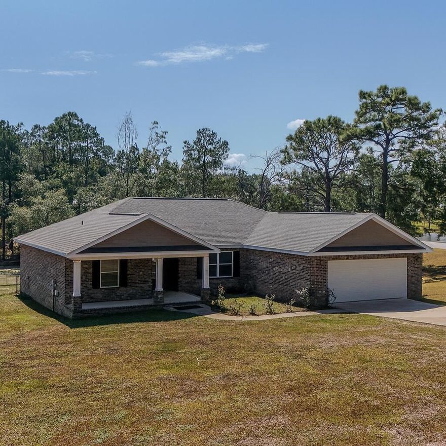 This spacious 4 bedroom, 2 bath home in the ever popular Ten Lake Estates is in excellent move-in condition, sits on nearly an acre with peaceful water views. Inside, you'll find a thoughtful split floor plan, LVP flooring and plenty of natural light. The roomy master suite has water views, double vanity, a separate tub and shower with easy-care cultured marble, and a walk-in closet, upgraded with beautiful custom built-ins. Three additional bedrooms provide space for family, guests, or a home office. Out back, a roomy deck looks over the water - perfect for morning coffee, weekend cookouts, or simply unwinding at the end of the day. And with the beaches a half hour away and historic downtown DeFuniak Springs only five minutes away, you get the best of both small-town charm and beach fun.