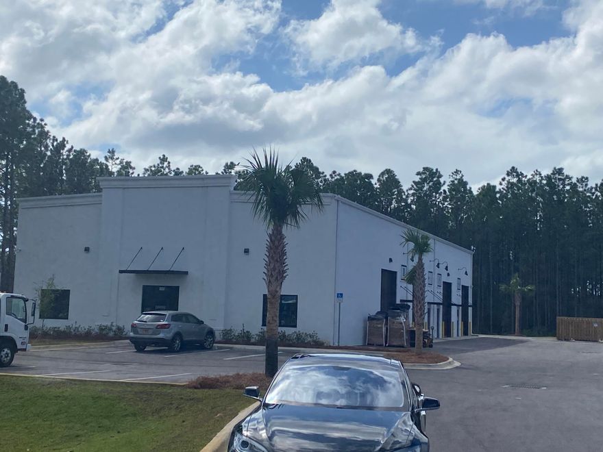Brand New Southern Riviera Business Plaza in South Walton Commerce Park. Completion February 2021 . 24' Ceiling height, roll up doors, bathroom, adjacent to new school and Sports Complex. Up to 12,000 sq ft available with store frontage and electronic roll up door. Fully Heated and Cooled! Power Doors, bathroom with water fountain. Stucco Exterior, Type ''A'' Industrial