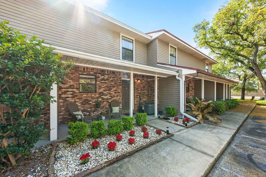 Set in the heart of Fort Walton Beach's shopping and dining corridor, this beautifully renovated townhouse offers effortless living in the desirable Garden Villas community. Every inch of the home has been thoughtfully updated; from the brand new roof, HVAC system, and water heater to the reimagined kitchen, new flooring, and completely renovated bathrooms. With nothing left untouched, it's truly a turnkey gem. The floor plan offers two generously sized bedrooms, each with its own private bath, ideal for roommates or visiting guests. The primary suite features a serene screened balcony, ideal for savoring morning coffee or enjoying quiet evenings. Downstairs, the living room flows seamlessly to another screened patio with direct access to the lush courtyard and sparkling community pool beyond. Stainless steel appliances and a designated dining area round out the updated kitchen, while a downstairs guest bath adds convenience. This move-in-ready townhome also includes two assigned parking spaces and scenic views from nearly every room. Centrally located between Eglin AFB and Hurlburt Field, with quick access to beaches and daily amenities, this Garden Villas home is ideal for military families, first-time buyers, or those seeking low-maintenance coastal living.