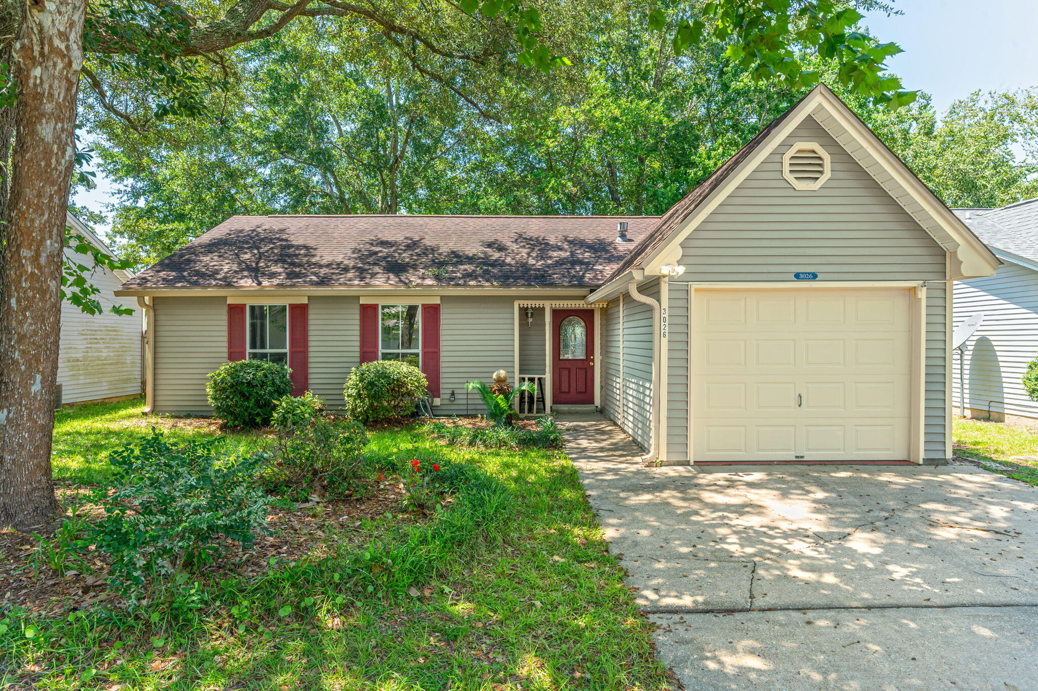 Welcome to your cozy Florida cottage! You'll love this charming home in the sought-after Blue Pine Village subdivision, within Niceville's Blue Water Bay area. Blue Pine Village features two pools, a BBQ area, and RV/Boat parking. Set on just over a tenth of an acre, this three-bedroom, two-bath home is move-in ready. Enjoy a covered front entrance and spacious eat-in kitchen. Laminate flooring runs throughout the living room and bedrooms, while tile is used in the bathrooms, kitchen, and dining area. The dining area features a bay window, and both bathrooms have skylights. Relax on your open patio in the private, fenced backyard. This home also features a one-car garage with an automatic opener, shelving, attic storage, and washer/dryer hookups (washer and dryer included), providing everything needed for comfortable living. Just minutes from Eglin Air Force Base, restaurants, shopping, and all the entertainment Niceville has to offer!