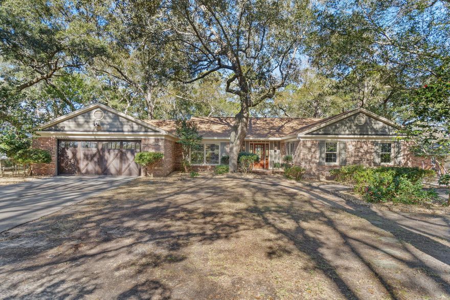 Welcome to your deep-water waterfront oasis in Valparaiso Shores, where modern luxury meets the tranquility of Boggy Bayou! This meticulously renovated 2,500+ sq.ft. home is a testament to coastal elegance, offering a lifestyle of sophistication and relaxation. Step into a world where every detail has been thoughtfully curated to create a haven that embraces the stunning waterfront views with 75 feet of frontage.As you approach the property, be greeted by lush landscaping and a charming brick facade with gas lanterns that sets the tone for what awaits inside. Take notice of the beautifully crafted wood front door and complementing the aesthetic of a charming wood garage door. The moment you step inside, you'll be captivated by the seamless blend of contemporary design and comfort.