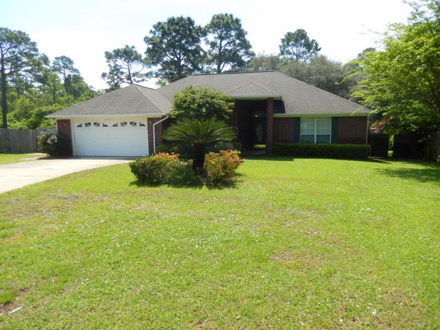 AFFORDABLE ELEGANCE ON .40 ACRE LOT WITH BEACH ACCESS IN BISCAYNE POINT! High ceilings & angled wood burning fireplace grab your attention immediately in the spacious great room. A 2nd family room w/laminate flooring & large windows provides add'l living space & access to the large wooden deck. Dine in style from your formal dining room or more casually in your breakfast nook. Beautiful NEW granite counters,center island & pantry accent the bright kitchen. Offering a split floor plan, the master with his & her closets & tray ceiling is located away from the other 3 bedrooms. His & her sinks, separate whirlpool tub & shower complete the master bath. Other features include 12 & 10 ft ceilings, lighted plant ledges, tile floors in the wet areas, 7 year old roof & large