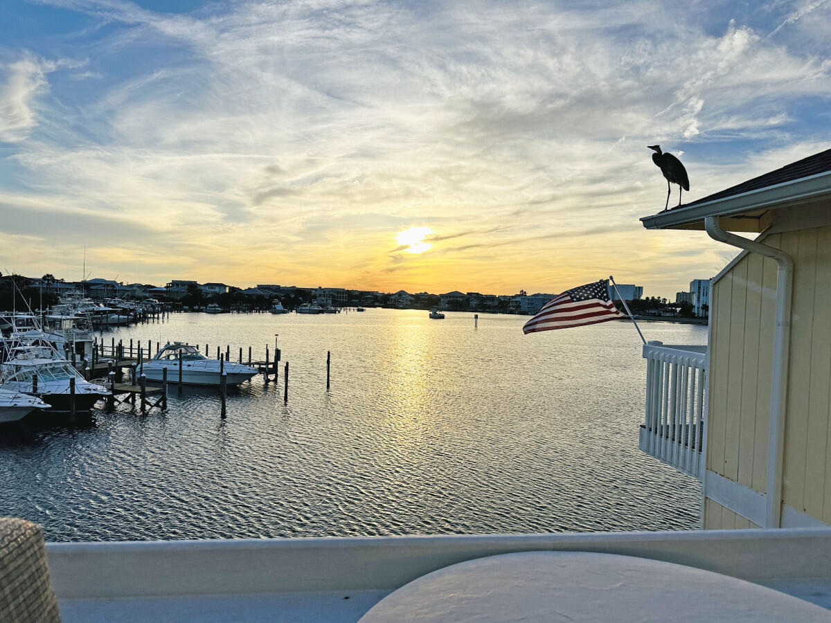 Nestled within the Sandpiper Cove resort, this unit boasts a prime location with a back deck that overlooks the tranquil harbor. Whether you're sipping your morning coffee or enjoying evening cocktails, the deck provides a front-row seat to the most beautiful sunsets you'll ever witness.Discover this beautiful 2-bedroom, 2-bathroom condo located right on the Destin Harbor within the sought-after Sandpiper Cove Resort. Unit 2229 offers stunning waterfront views, creating the perfect blend of relaxation and coastal living. This unit features a spacious living area, a fully equipped kitchen, and a private balcony overlooking the harbor. As an owner, you'll enjoy access to Sandpiper Cove's extensive amenities, including five pools, hot tubs, a private beach with seasonal beach service, a 9-hole par-3 golf course, tennis courts, and an on-site restaurant. Just a short distance from the white sand beaches and Emerald Coast waters, this harbor front condo is ideal for both vacation rentals and year-round living.

Experience the best of Destin's harbor lifestyle in this prime waterfront condo. Don't miss out on this rare opportunity!