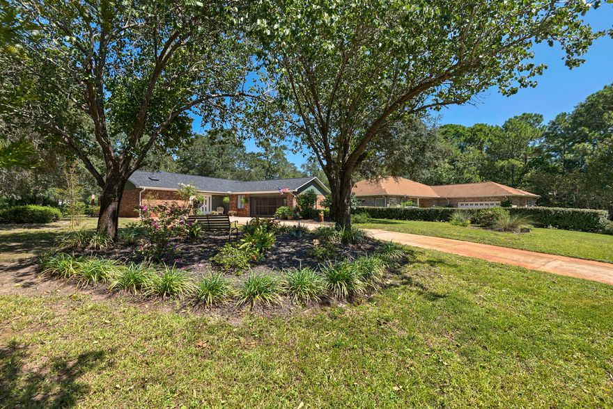 This charming brick home in Bluewater Bay Resort is immaculately maintained and has undergone many renovations over the last two years. It backs up to the golf course and features a split bedroom floor plan, a living/dining area with wood burning fireplace, and a bright Florida/Family room. Attached garage has lots of storage area, plus room for two cars. Home has recently been repainted inside and out. Kitchen has been remodeled with all new custom cabinets, appliances, and plumbing fixtures. Both bathrooms have new custom cabinets and new fixtures. Hot water heater and heating/cooling system are new. Carpet is less than two years old. Home features an automatic yard sprinkler system and a new Generac 22KW whole house generator. Wonderful neighborhood with no formal HOA or fees.