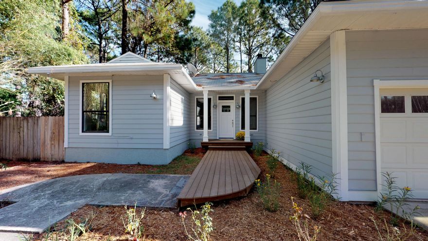 BEAUTIFUL RENOVATED HOME NESTLED ON A LARGE WOODED LOT. FLOORING, LIGHT FIXTURES, TOILETS,KITCHEN CABINETS WITH GRANITE COUNTER TOPS, DISHWASHER, RANGE, WINDOW PANES, INTERIOR AND EXTERIOR DOORS, CROWN MOLDING, LARGE BASE BOARDS, CASING, ARE ALL NEW! LOCATED 1/2 MILE FROM PUBLIC BOAT RAMP.