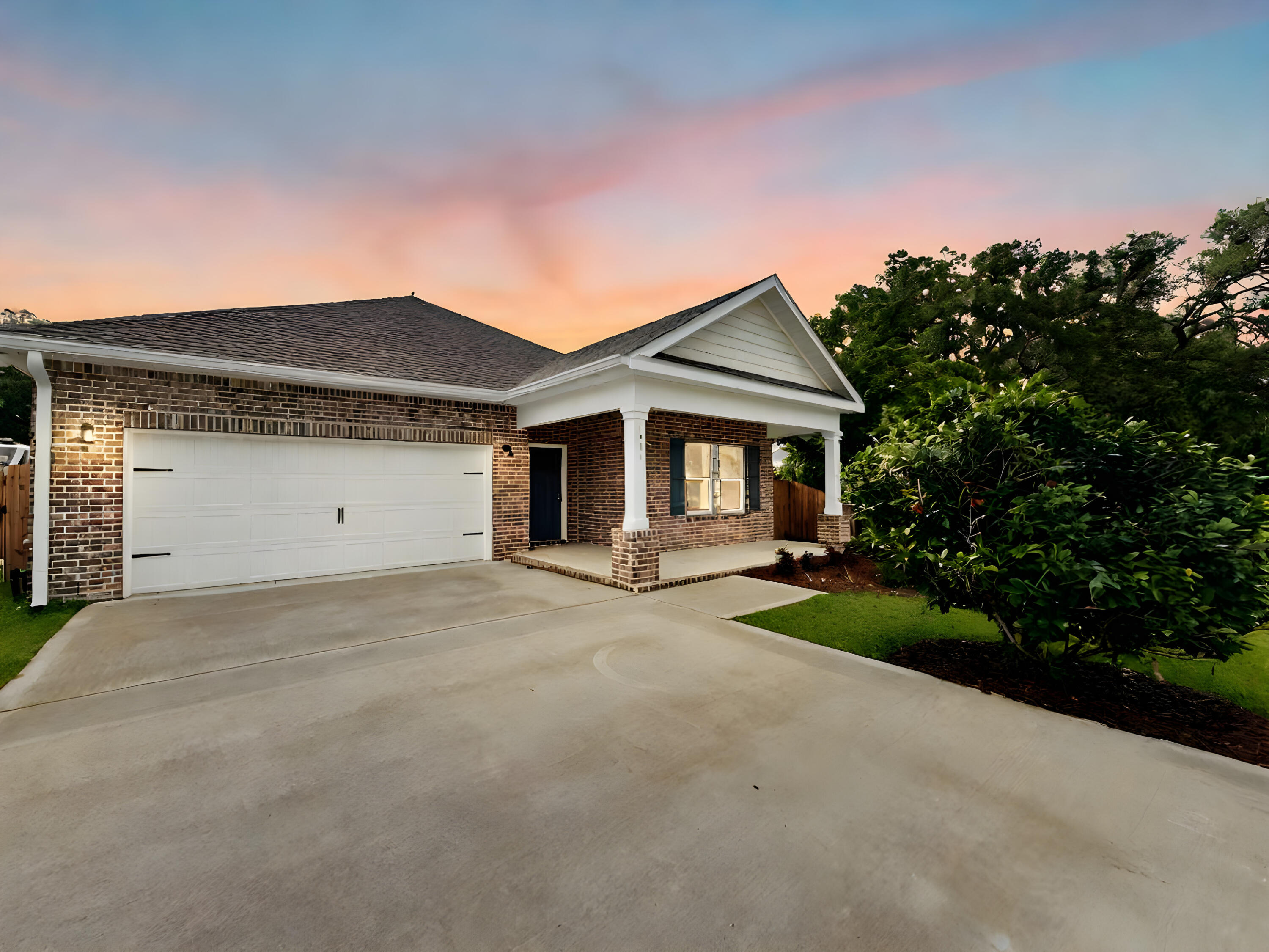 This new construction home can be ready September 30th and features 5 bedrooms and 3 full bathrooms, offering an ideal space for creating memories with your loved ones. With a spacious 2,340 sq ft of living space and an 2.5 car garage, this home combines modern comforts and Southern charm seamlessly. The kitchen is well-appointed with granite countertops, tiled backsplash, soft close shaker cabinetry, pendant lighting over the island and a stainless steel appliance finish. LVP flooring graces the entirety of the home, adding both style and durability. This custom home is adorned with crown molding, trey ceilings, and Matte Black hardware, providing a contemporary touch. You'll also enjoy lower electric bills due to the use of natural gas for the heat, cooking range, dryer hookup and tankless hot water heater. Additional Inclusions: Your new home comes complete with a fence for added privacy, blinds for comfort, and a fridge for convenience. Don't miss out on this incredible opportunity to make this house your home. Contact us today to schedule a viewing and take advantage of this fantastic offer before it's gone!