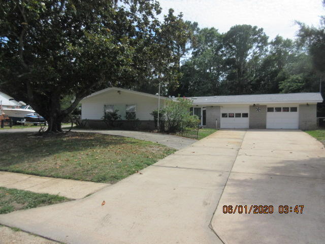 Check it out!!! Great single story home in neighborhood with sidewalks!!!! Freshly painted, new flooring, new shower tiles, HUGE oversized 2 car garage, boat and or RV parking, circle drive , Jennaire cooktop/Double wall oven . 2 nice sheds for lawn equipment, kids toys (or Dad's) Beautiful all brick FP hearth to decorate for holidays. Great home for entertaining. Enjoy the Sunsetter patio cover. Owner is providing lawn service so you can enjoy the home and family!! Close to schools, shopping, restaurants, both bases.