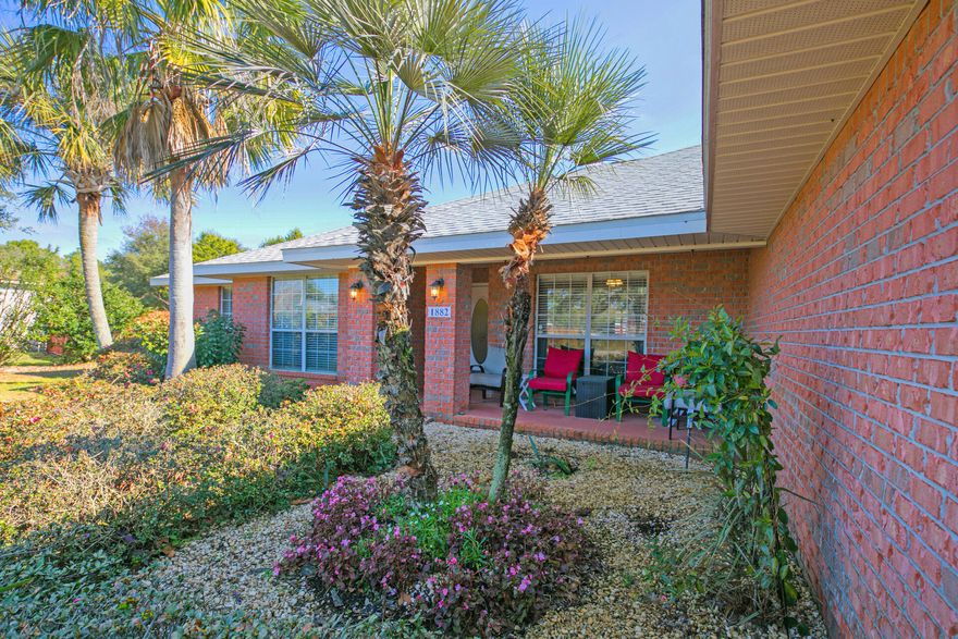 Need space?  This home has 4 bedrooms, 2 baths, living room PLUS den, eat in kitchen PLUS formal dining room on a huge almost half acre fenced in lot!  Come inside to the large open space with completely remodeled kitchen boasting shaker cabinets, granite countertops and reverse osmosis water filter.  No carpet here...ceramic tile throughout. This home has split bedrooms with a completely remodeled master bath. Outside you will find an all brick exterior, a newer shed and fruit trees. Plenty of room for a pool!  It is conveniently located toward the entrance of Holley by The Sea and near all HBS amenities such as swimming pools, tennis courts, boat launch, playground, fitness center and more.  Roof, water heater and well pump new in 2019.  HVAC 2021.  Call today!