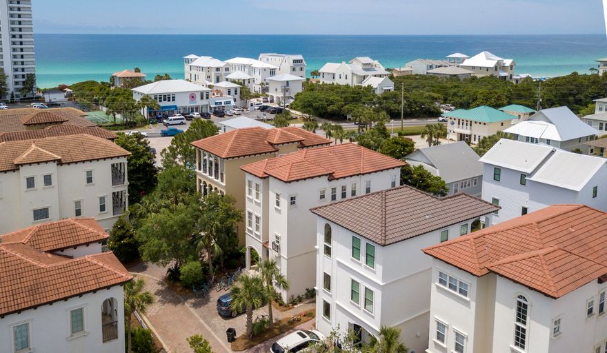 *Under-Contract with Kickout* Located behind the private gates of Palmeria Villas at Seagrove, a Mediterranean beachside development resides the luxury residence of 148 Palmeria. This gorgeous villa offers 4 master suites, a covered cabana pool, high ceilings, 2 living areas, and is located only 600 feet from the beach! The first floor offers a grand living area with an abundance of natural light, a kitchen/dining combo with coppered ceilings, designer furnishings and access to the covered pool featuring Brazilian ceilings, a wet-bar, bathroom and access to the back yard. Winding up to the second level you are greeted with a bunk room, an additional living area  w/en-suite (which easily be converted to accommodate a 5th bedroom), and a custom built-in seating area with storage. A master-suite with French doors, a walk-in closet and en-suite is located on the western side. The third floor is bright and airy and boasts two master suites with spa-like en-suites, and a sitting area - with the main master offering gulf views and ocean breezes.

This beach home is offered fully-furnished with an established and strong rental history. Palmeria Villas is nestled a mile and a half from Seaside, is across from the beach access, and centrally located near all the world class shopping and dining venues. A cost to own, feature & finish list is available upon request. Please inquire today.