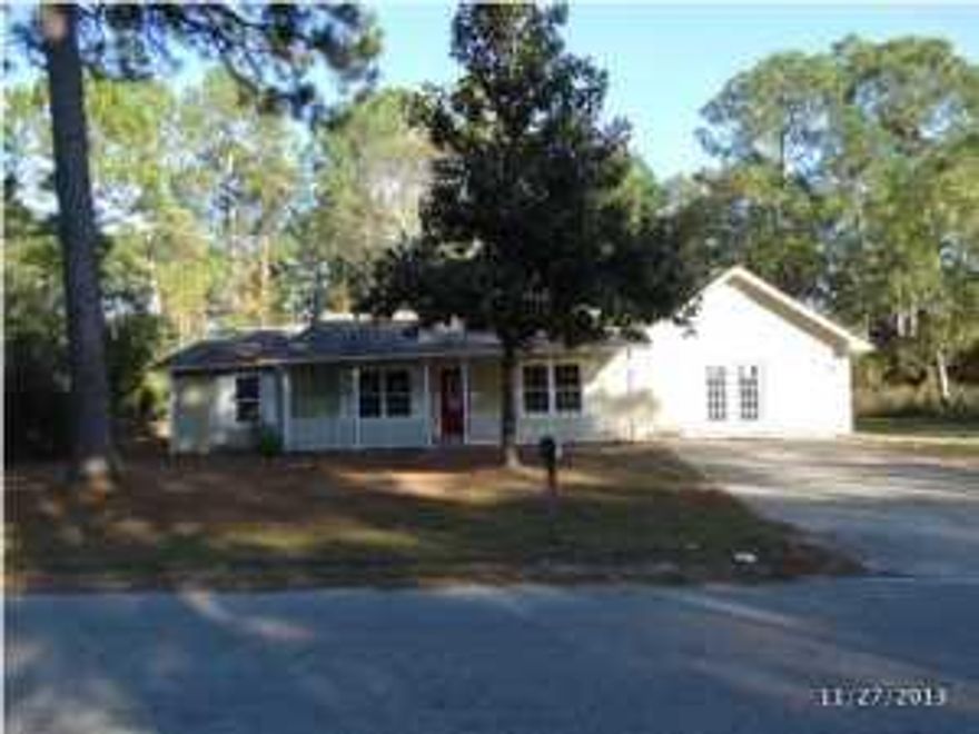 PRICE REDUCED!! Perfectly Located 3 BDR 3 Full Bath with Bonus Room/Bedroom -Potential 4 BEDROOMS!-Home in heart of Navarre walking distance to shops, stores, & local restaurants-Home is completely Tiled Throughout for easy clean -Smooth top Stove, Microwave & Dishwasher conveys with home-Florida Sunroom-20x20 master bedroom-spacious Laundry room-Bonus Room could be an ensuite with its own private full bath & closet -Fresh New Paint throughout- very spacious yard and side lot a little under 1/2 acre -side lot Electrically wired & foundation poured cement for recreational building &/or detached garage