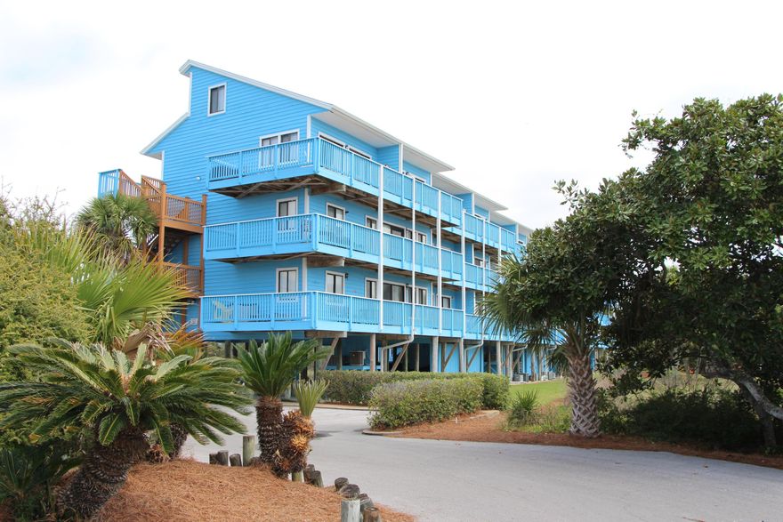 Tropical beach bungalow with Gulf views-Listen to the waves and catch a sea breeze as you enjoy morning coffee or an afternoon nap on your wrap-around deck. This two bedroom, two full baths condo is located in the quiet area of Seagrove Beach. The kitchen has been updated with granite countertops, new carpet in bedrooms, new floors in living area with crown molding, newly painted and a pantry helps with storage. Open concept living and dining makes for great house parties. Close to pool and beach, this condo is centrally located for fun and sun.