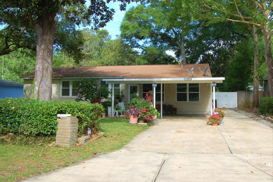 Charming and affordable home located in the heart of Fort Walton Beach in the tranquil Garnier Beach neighborhood. White sandy beaches and emerald green waters of Gulf of Mexico minutes away. Home conveniently located near Hurlburt and Eglin Air Force Bases. You are near public boat Launches, Publix Grocery, shopping, dining, schools, and so much more! This spacious home boasts stainless steel appliances and the living room is open to the dining area that leads to the kitchen. For year-round outdoor enjoyment, there is a finished Florida Room behind the kitchen that opens to a shaded large back patio leading to the fenced backyard hosting several shade trees. Property being sold As-Is. Do not miss out and come see this beautiful home today!