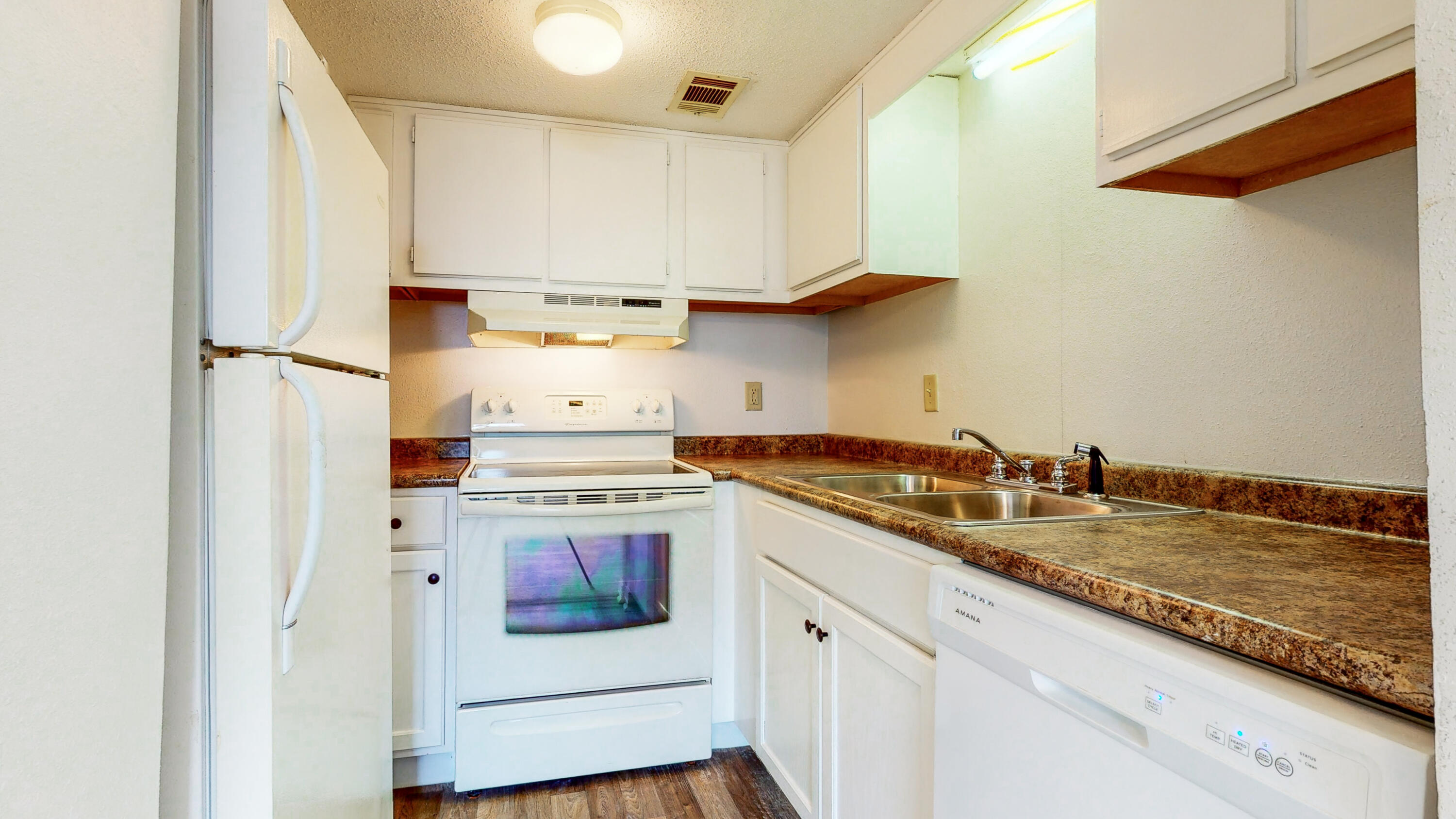 This well-maintained 2-bedroom ground floor unit is conveniently locatedon the west side of the complex, only steps from the community pool and the bay. Recently renovated with fresh paint, carpet, freshly painted cabinets, countertops, and more. Finisterra is a gated  bayfront condo complex with amenities that include a large sparkling pool, tennis & handball courts, a clubhouse, indoor laundry facilities, and assigned parking.