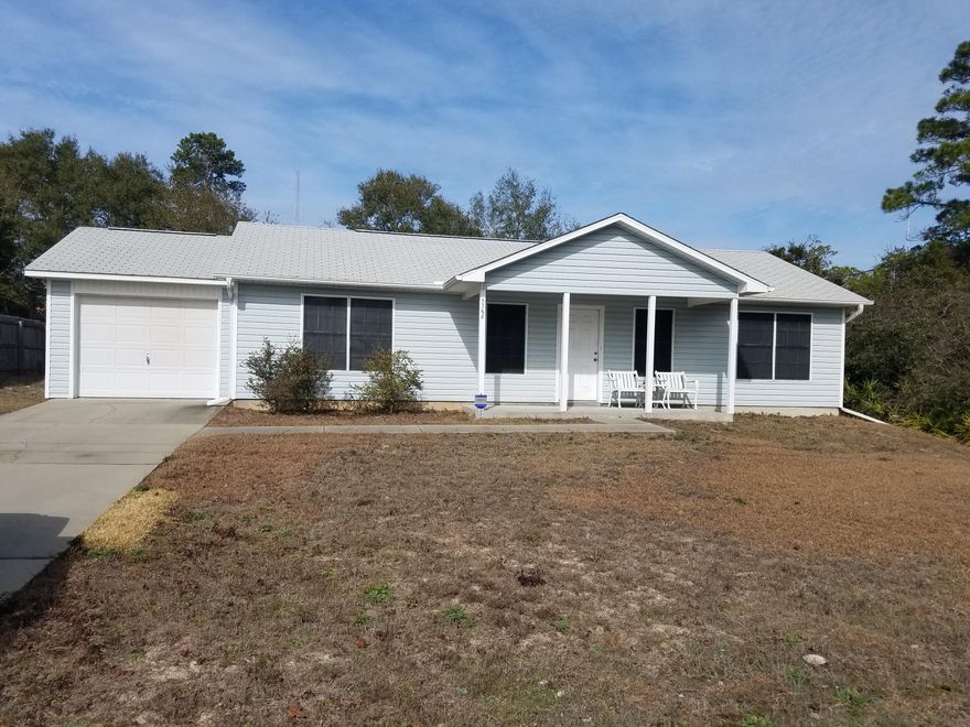 Open 3 bedroom, 2 bath split plan with one car garage. Low maintenance exterior, generous lot size and conveniently located near neighborhood boat launch. Home features an inside laundry, large closets and oversize one care garage. The kitchen has a flat top stove, window over sink looking into backyard and an attached dining area. Close to Pensacola State College, Gulf Breeze and Navarre. What I love about the home Location, location, location! This adorable home is move in ready, clean and has been well taken care of by the original owner.