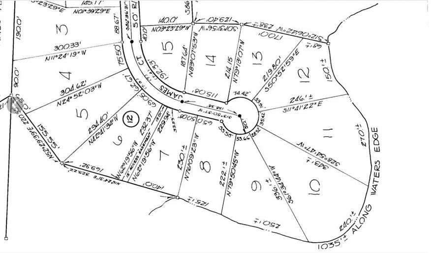 One acre lake front lot at one of the widest points in the lake. Dock has beautiful panoramic views of the lake. Property is partially cleared but still has many large hardwood trees that create a canopy of shade and an amazing home site. Great neighborhood only about a mile from the high school. Located just around the corner from the Juniper Lake boat ramp and park.