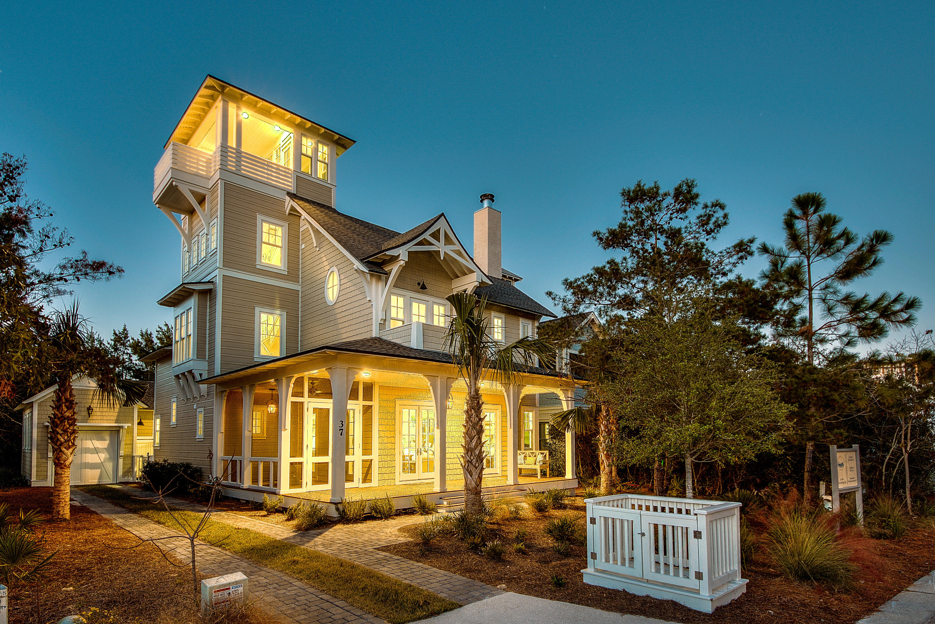 The ultimate WaterSound lifestyle awaits you in Bridges at this coastal masterpiece. Seller is now graciously offering a WaterSound Beach Club membershipand one year of dues paid with this home!. Every detail has been fine-tuned and executed to perfection by Baker Design resulting in beautiful, bespoke designs with amazing space for all. Boasting four bedrooms, five bathrooms and a powder room, this inviting home will surprise and delight you with its spacious kitchen and oversized island, tons of storage and breakfast bar seating which opens up to the living and dining areas. Hardwood floors throughout the home create a depth of warmth that is enhanced by the fireplace in the main living area.