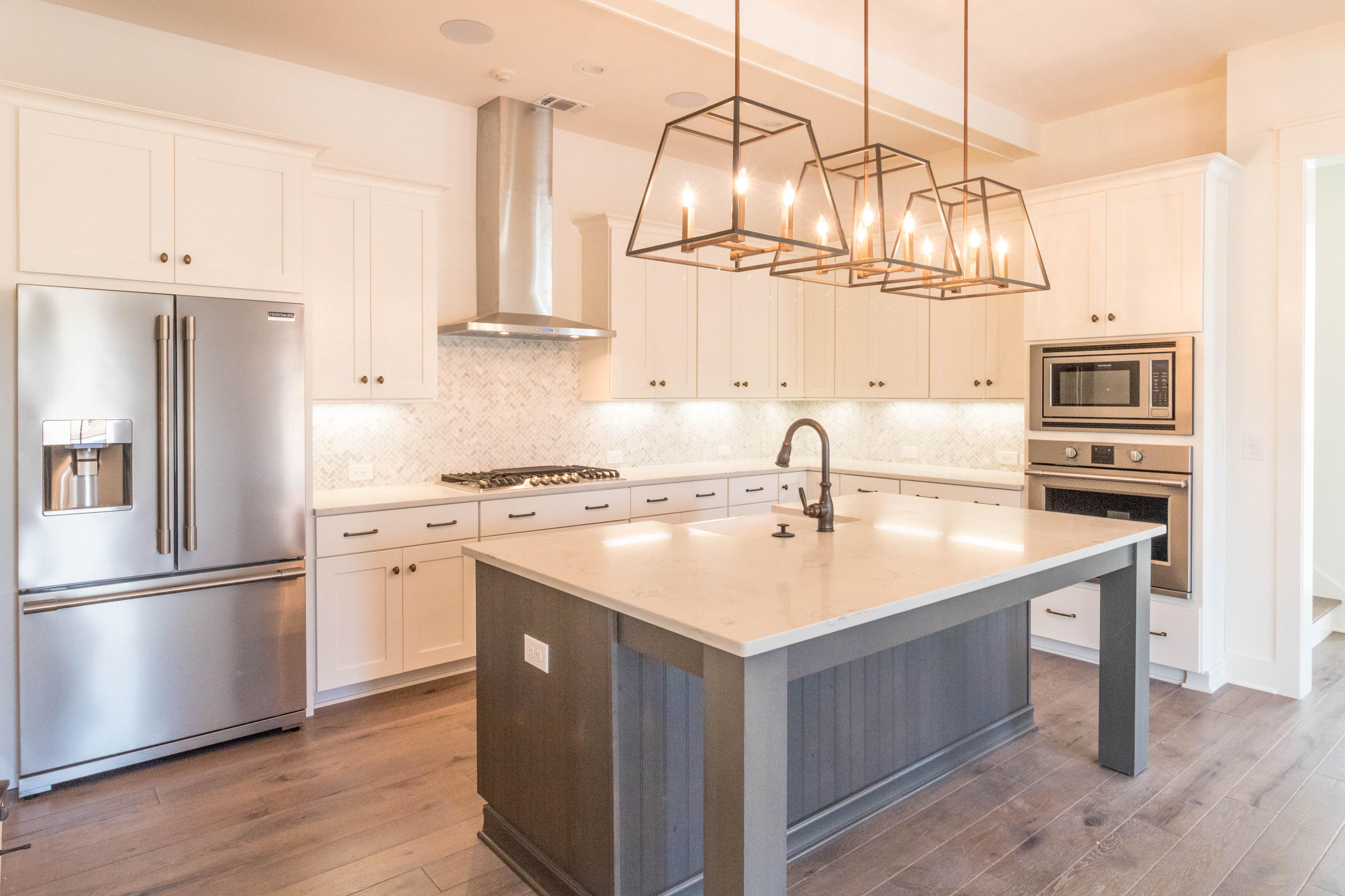 This home is under construction and will be ready for move in May 2018. Randy Wise Homes newest neighborhood in South Walton. Ridgewalk is a French inspired coastal community with only sixty six home sites and no short term rentals. This beautiful brick home is our Calais B floor plan with three bedrooms and two and half bathrooms. Beautiful quartz countertops, engineered hardwood flooring, lap and gap accent walls, beautiful lighting through out the home. This home has a one car garage and spacious courtyard and a covered porch. It's beautifully landscaped and waiting for you to call it home. Come to Ridgewalk today. Our sales office is open daily.