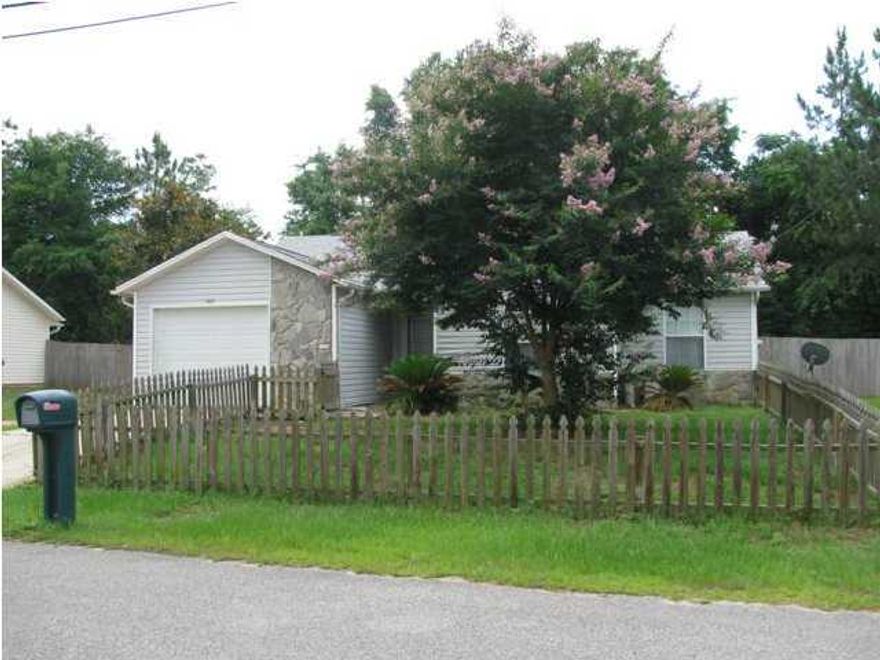 Short Sale. This 4 bedroom home located on the south side of Crestview is now available. Home has a spacious tiled living room as well as another bonus family room which could be a play room or office. Kitchen is galley style and opens to the dining area and is also tiled. Master Bedroom has a trey ceiling and master bath is tiled. Roof and HVAC were newly installed in 2010. Back yard has a privacy fence and the front is also fenced.