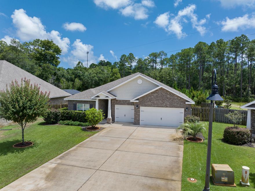 Welcome Home! Step inside and imagine your new home layout- deep cleaned and polished. It's ready for you to move-in and take advantage of the amazing upgrades, including Solar Panels which are COMPLETELY PAID OFF! They are already soaking up those rays that pay and any buyer can benefit from this solar home system. With most of the warranty life intact, rest assured the system will continue to work for years to come. (More info in MLS Documents.)Combine solar power with the smart-tech of the Nest Thermostat and really enhance coziness from near or far.4 bed, 3.5 bath with a 3 car garage which begs for guests has accommodating space both inside and out. Thoughtful enhancements to the original design include tile in the dining-kitchen-cafe, tiled back patio, screened-in back patio, & (continued) Thoughtful enhancements to the original design include tile in the dining-kitchen-cafe, tiled back patio, screened-in back patio, as well as a recent paint touch-up throughout the home and a deep clean. 
Natural light floats into the kitchen and cafe areas as well as each bedroom and the open floor plans allow for larger furniture and/or individual room layouts. 
The screened in patio begs you to come out and relax- enjoy the sounds of nature into eternity via the natural preserve which has been purchased by the community, and has no future plans of construction. The preserve is separated by an easement that's used for maintenance, and owners as needed (for perhaps installing a pool!). The owner put in an additional 500 SqFt of fencing to enclose the yard, so it's now pet friendly too!
A shallow water well has been installed as well as a water treatment system for the sprinklers. No "rust" on the house or driveway! Plus, the plants grow much healthier. 
Green thumbs or cactus collectors can rest easy knowing the beautiful fruit trees and garden that currently thrives, does come with a support shed. Included is a year-round seasonal feeding & care chart to maintain the current plants, as well as the special "foods" that these plants crave. (Blackberries, Grapefruit, Lemons, Rosemary, Fig & Olive trees, plus a gardening box!)

Peach Creek is made up of beautifully secluded, natural settings off of Hwy 98, with easy access to Scenic Hwy 30A and Gulf Coast beaches.
Plus access to the Waterway! There's a nearby public boat launch at Point Washington Landing to explore and enjoy the Choctawhatchee Bay and some of Florida's most serene landscapes.
Peach Creek is close to Windswept Dunes Golf Club, health facilities, colleges, and 30A's attractions, shopping, and dining for families or a more romantic night out on the town.