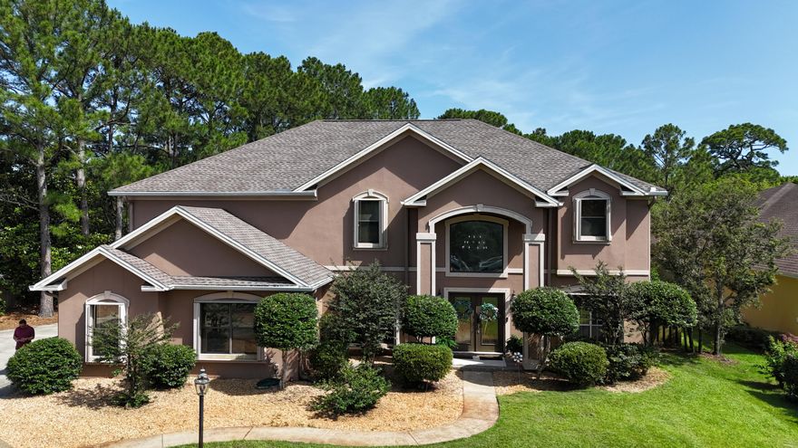 Welcome to your beautifully renovated retreat in the gated golf course community of Emerald Bay. This exceptional home offers a perfect blend of comfort, luxury, and functionality, starting with a chef-inspired kitchen featuring an induction cooktop, wine cooler, and two dishwashers -- ideal for effortless cleanups after hosting friends and family. The spacious living areas are wired with surround sound speakers, and thoughtful upgrades can be found throughout the home, including a full home security system, two sets of washers and dryers, a tankless water heater, and a brand-new roof. The oversized three-car garage includes custom flooring, built-in cabinetry, and generous shelving for extra storage.Step outside and you'll find a true backyard oasis designed for relaxation and and entertaining. The fully equipped outdoor kitchen features two Green Egg grills, a wet bar, a built-in fire pit, and even a mounted TV  all set within a large, fenced yard framed by mature trees for added privacy.

Beyond the property, Emerald Bay is one of Destin's premier gated communities, renowned for its 18-hole golf course, clubhouse, resort-style pool, tennis and pickleball courts, and 24-hour security. Ideally located just 2.6 miles from the nearest public beach access, the home is also just minutes from world-class shopping and dining at Destin Commons, including the area's only Whole Foods. Legendary Marina is a short drive away, and you're within 10 minutes of over 50 restaurants, Big Kahuna's Waterpark, movie theaters, bowling, and multiple beach access points.

This is more than just a home  it's your gateway to the best of coastal living in Destin.