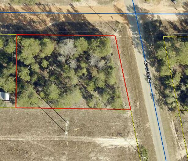 Looking for a great property to build or mobile homes are allowed this 2-corner lot parcel has paved road frontage and faces two separate roads. Mossy head water is available and power runs in front of lots. Lots are level and wooded and allows for plenty of privacy in your own clearing.